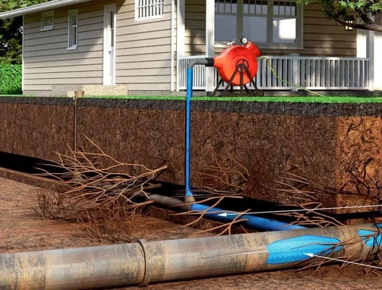A no-dig drain repair process being carried out in Nowra to fix a cracked underground pipe without excavation.